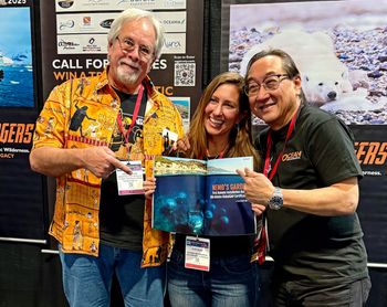 Ocean Geographic Magazine introduced a new edition at the 2024 DEMA Show, in Las Vegas. PCD, Science Editor Alex Rose and Publisher Michael Aw are shown with Paul's 10-page article about Nemo's Garden. Photo: Mary Sayre
