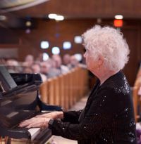 Marilynn Seits plays piano music for the residents of Arbor Terrace, Evergreen Room. 