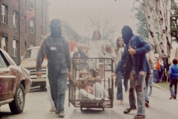"Tiger Cage on Wheels", (In Performance), Dean Gallery & Streets, Minneapolis, MN, 1974 (Photo ?)
