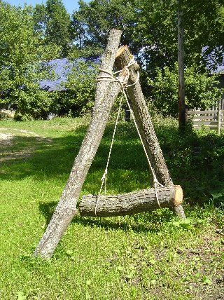 "Timber Tie", mixed media, Billy X. Curmano - Tree timbers play dress-up at the old Art Works USA
