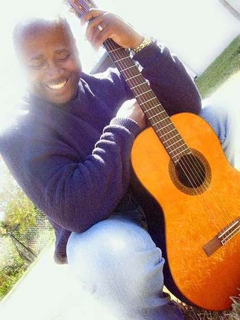 This is one of my favorite guitar shots. I don't know why. I just love it 'cause it seems such a happy pic. Taken by my daughter Mia (go Girl!).
