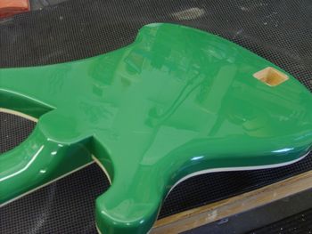 I've just finished buffing the cured lacquer......the small route in the back will house the 2 9v batteries for the active electronics.....
