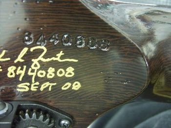 The gold text is retouched, and the final topcoats are applied.  This custom bass is now sturdier than ever, and ready for service once again!
