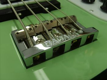 The Badass bridge has a massive baseplate for sustain and improved tone.  The entire unit was recessed into the maple body for a sleek look, feel and function....
