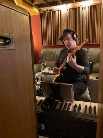 John plays electric guitar through in room speakers at Bova Sound, Critical Misunderstandings On The Precipice sessions.
