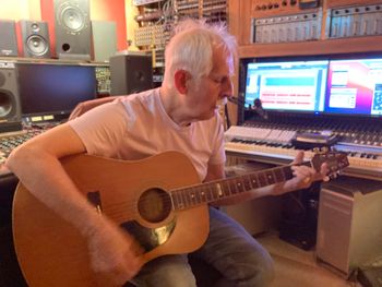 Phil strumming along during final lead vocals sessions at Bova Sound.

