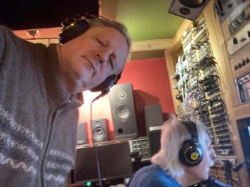 Frank and Phil listening intently to John playing acoustic guitar tracks, Critical Misunderstandings On The Precipice sessions!
