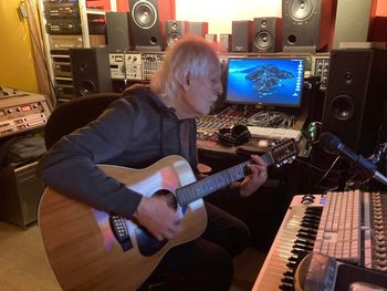 Phil plays Gord's 12 string acoustic guitar as we listen in the studio to Our Love Was In Danger and Gord’s various brilliant drum tracks. Critical Misunderstandings On the Precipice sessions.

