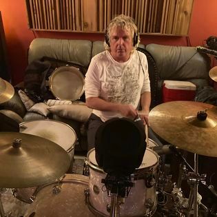 Gord Finley drumming up a storm at Bova Sound during Critical Misunderstandings On The Precipice sessions.
