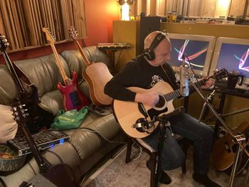 John plays multiple acoustic and electric guitars at Bova Sound, Critical Misunderstandings On The Precipice sessions!
