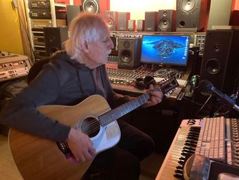 Phil plays Gord's 12 string acoustic guitar as we listen in the studio to Our Love Was In Danger and Gord’s various brilliant drum tracks. Critical Misunderstandings On the Precipice sessions.
