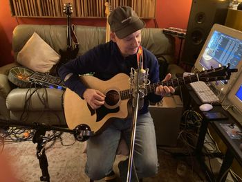 John setting up to play 12 string acoustic guitar at Bova Sound, Critical Misunderstandings On The Precipice sessions.
