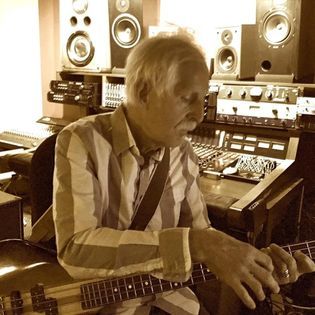 Fabulous black and white photo of Phil on electric bass during the Tendrils album sessions.
