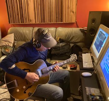 Lots of electric guitar on several tracks with several guitars, John Findlay Critical Misunderstandings On The Precipice album sessions.
