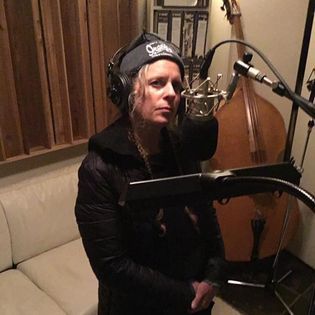 Rebecca looking demure as she sings harmony and back-up vocals during Tendrils album sessions.
