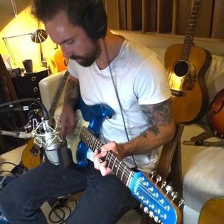 Blair delivers on electric guitar during Tendrils album sessions.
