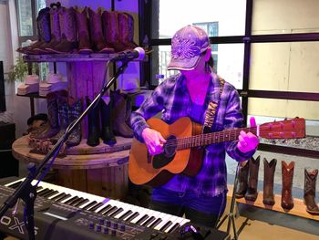 Texas Gospel Blues Singer Songwriter Kimberlee M Leber Doing an In-Store Performance
