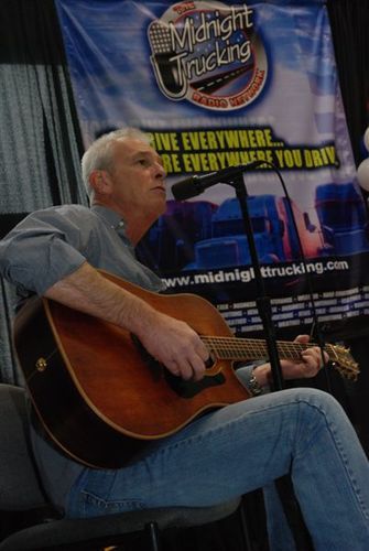 Performing at the Midnight Trucking Radio booth.
