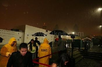 One would think pouring rain like this would keep the clubbers away...
