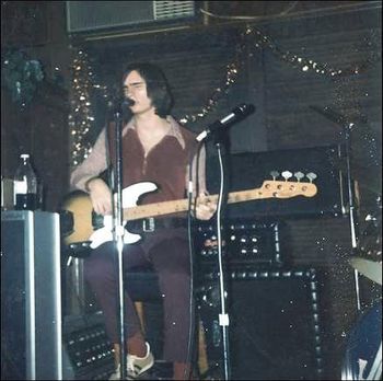 Playing my 1951 Fender Precision Bass. Dig the threads. That was many years (and pounds) ago.
