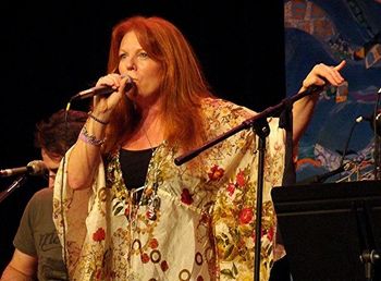 Tracey at Farm Aid photo by: Robert Clinton

