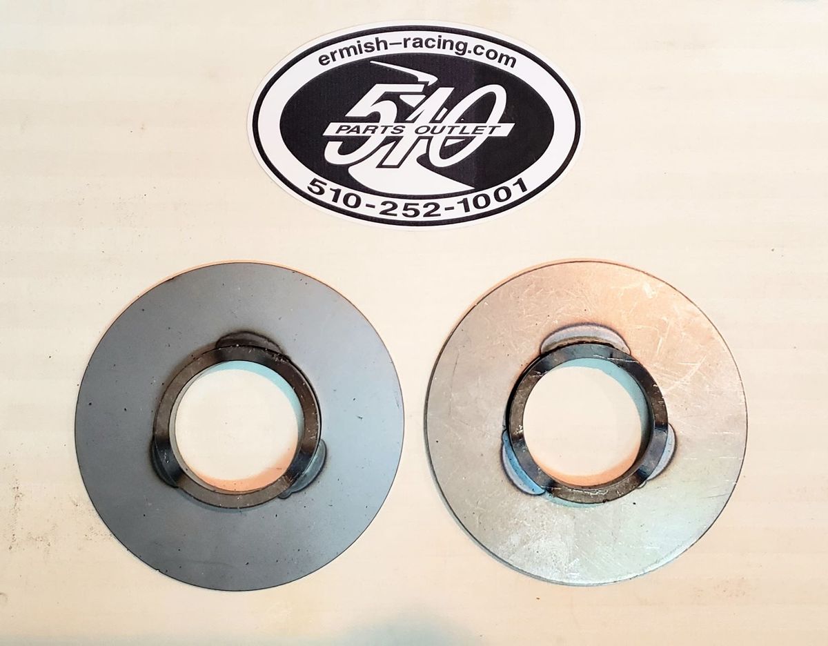 Trailing arm weight jacker spring plate