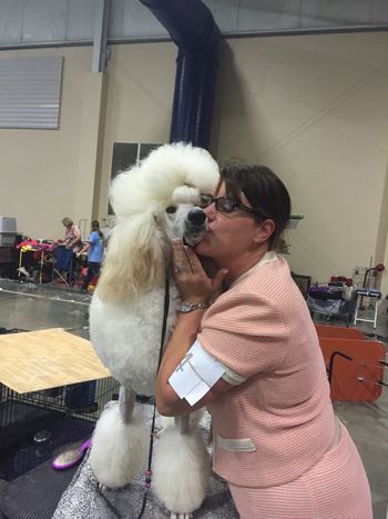 Handler Sarah giving Tatiana a congratulatory kiss
