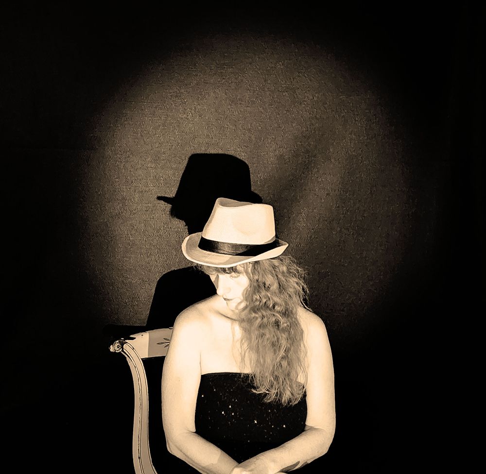 Heather Richards in a sepia-toned portrait from the News For You music video