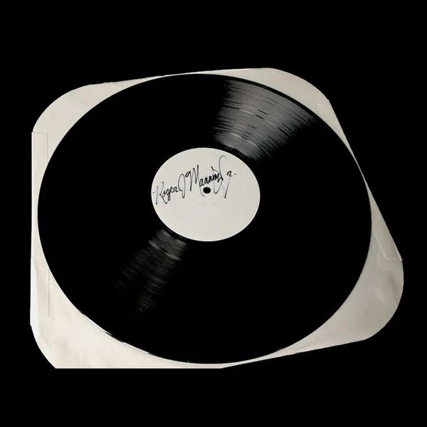 SIGNED Vinyl Test Pressing Of One Of Roger's Albums/EPs!