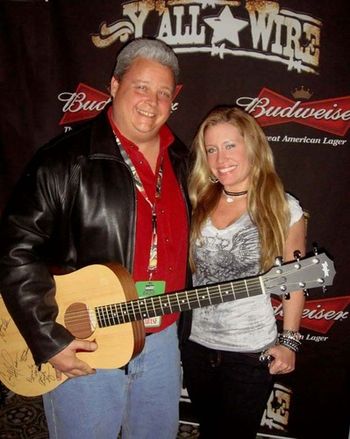 Mr. Clanci from WQSI winning the Taylor Guitar during the showcase! woowhoo!
