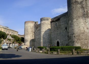 This Castle in Cantania, Sicily use to be on a hill above the city, but because the volcano has kept erupting and destroying the city, they keep rebuilding so now the city is level with the Castle! Amazing!
