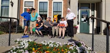 Acting silly after a fun afternoon in Pella.  What else is there to do when you've eaten your weight in Poffertjes and have a bag of props to play with?
