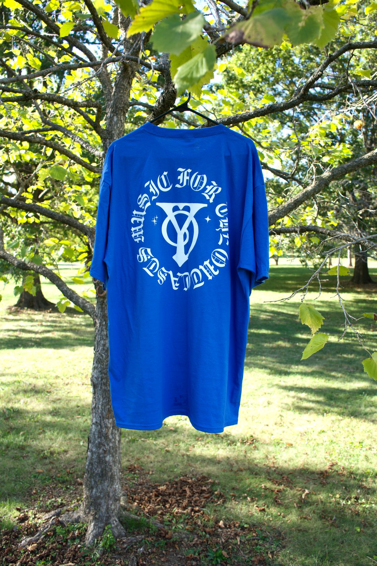 Blue “Outcast” Tees