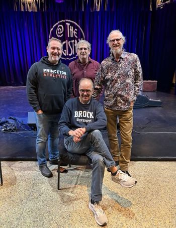 Jan with the Arrogant Worms prior to show for interview for the livestream show. Back row left to right: Chris Patterson, Trevor Strong, Jan. Front row Mike McCormick
