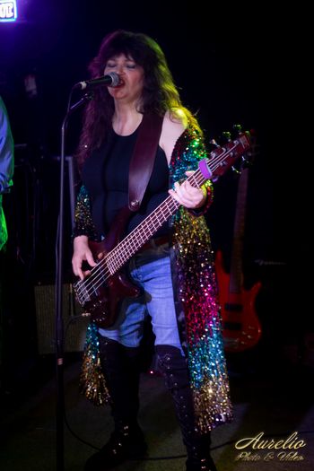 Barb Ussery is our bassist and vocalist. Her solid thumping locks in the groove, and when she and Angela get busy with powerful vocals, watch out!   Photo credit: Aurelio Mireles
