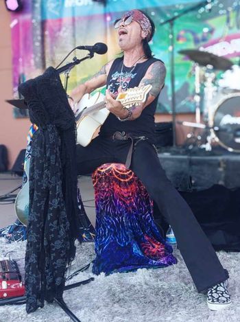 Aaron Leigh performing Acoustic Vintage Rock N’ Roll.
