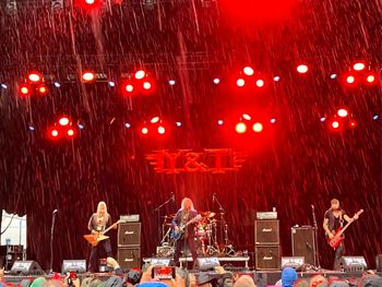 Aaron Leigh on stage with Y&T.
