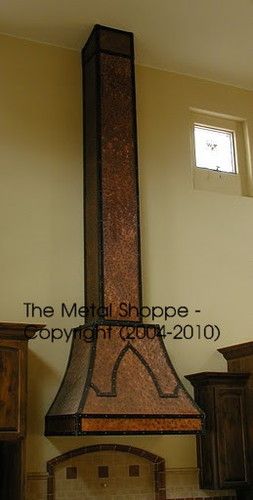 Large Custom Wall Mount Copper Hood with Matching Duct Cover. Forged Iron Strap Accents to Match Tile Pattern / Location: Lemoore, CA
