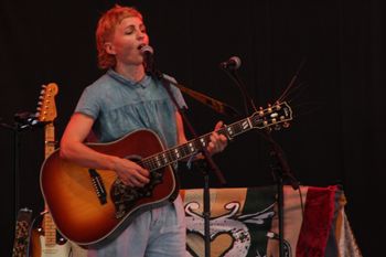 Hannah from Sound of the Sirens singing her heart out at Beautiful days Festival 26 | The Source Studio Exeter
