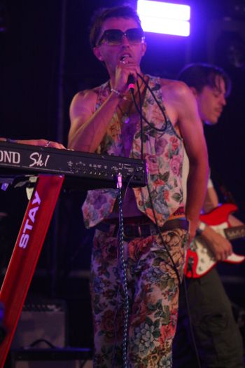 Dub Catalyst's Rudy captivating the crowd at Beautiful days Festival 26 | The Source Studio
