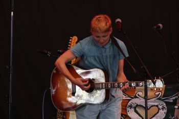 Hannah from Sound of the Sirens rocking at Beautiful days Festival 26 | The Source Studio Exeter
