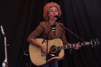Abbe from Sound of the Sirens singing her heart out at Beautiful days Festival 26 | The Source Studio Exeter
