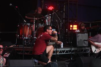 Dub Catalyst's big Dave sits at Beautiful days Festival 26 | The Source Studio
