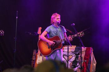 Hannah from Sound of the Sirens mesmerising the crowd at Beautiful days Festival 26 | The Source Studio Exeter
