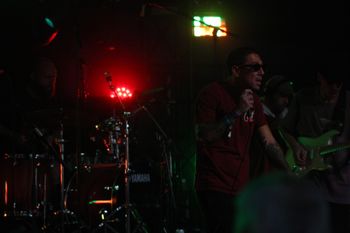 Moody shot of Dub Catalyst at Beautiful days Festival 26 | The Source Studio
