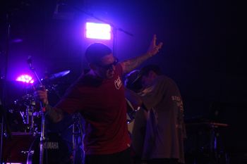 Dub Catalyst's big Dave in the lights at Beautiful days Festival 26 | The Source Studio
