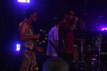 Moody shots of Dub Catalyst & crowd at Beautiful days Festival 26 | The Source Studio
