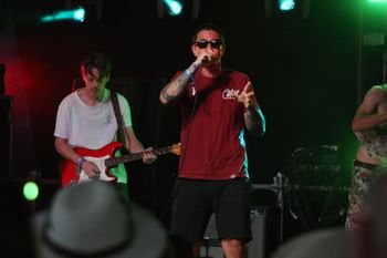 Dub Catalyst's vocalist and guitar player capacity crowd at Beautiful days Festival 26 | The Source Studio
