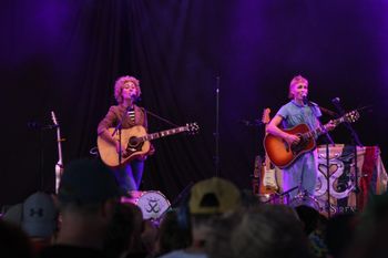 Sound of the Sirens singing to the crowd at Beautiful days Festival 26 | The Source Studio Exeter
