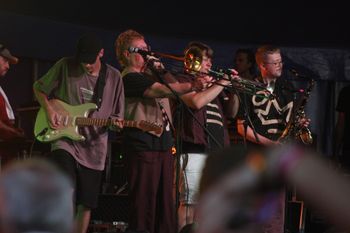Dub Catalyst's horn section at Beautiful days Festival 26 | The Source Studio
